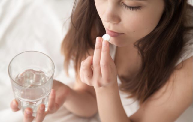 Women taking medication which can be causing her dry eye